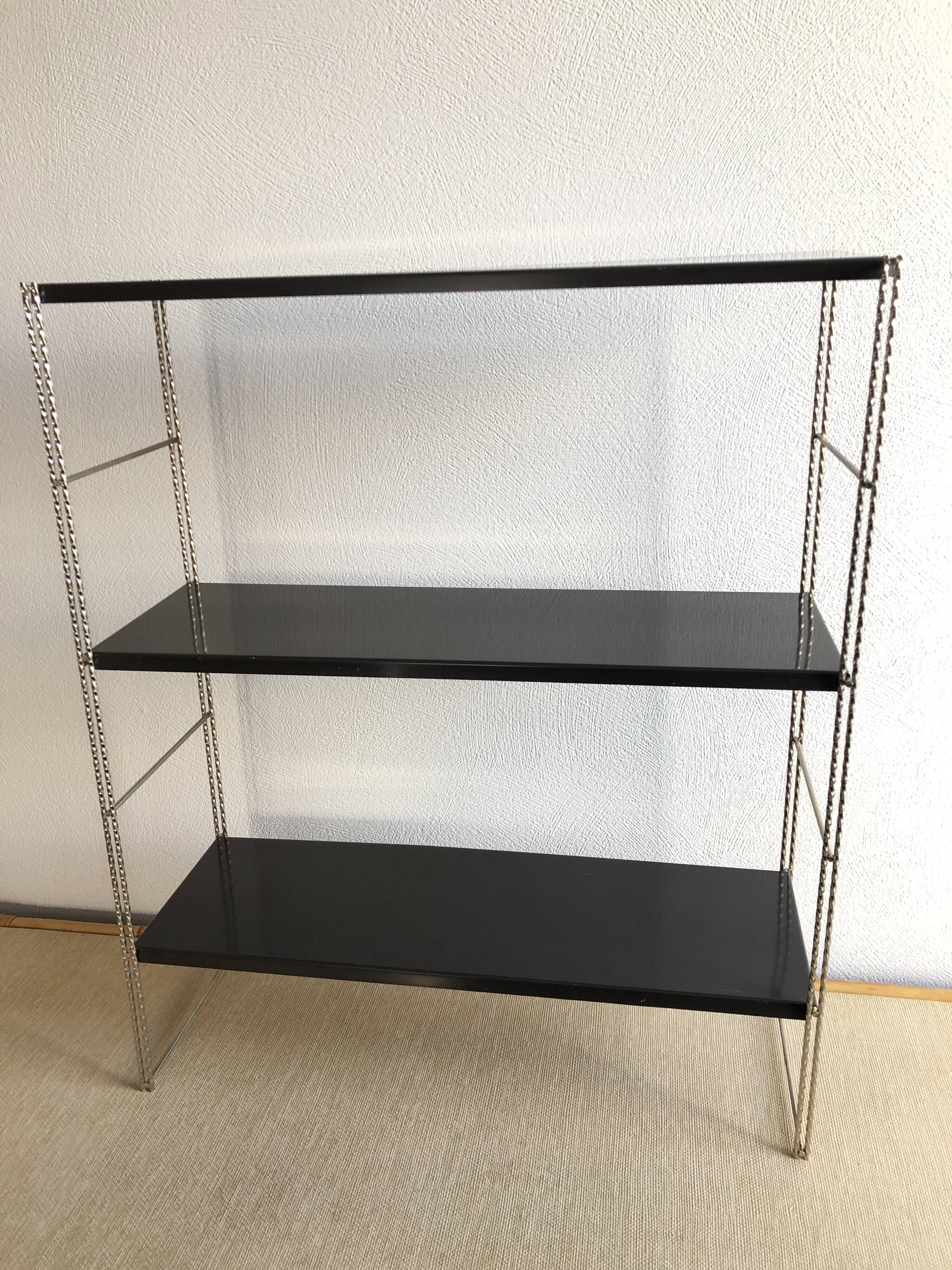 String shelf creation mofp gold and black