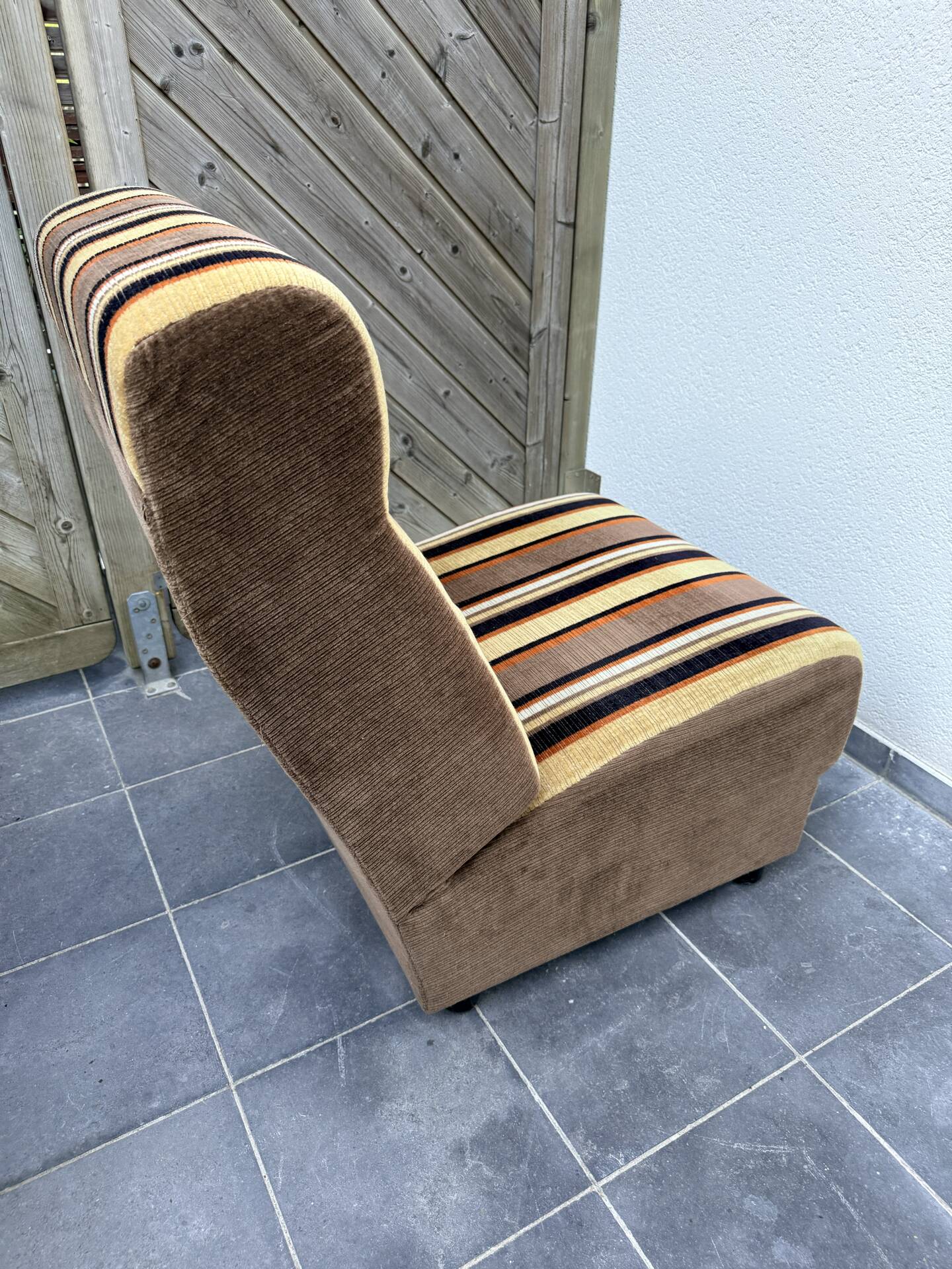 Vintage 1970s lounge chair – striped orange, brown, and cream velvet