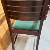 Set of 6 chairs and 2 armchairs by Gaston Poisson