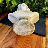 Bust of a woman signed Arnaldo Giannelli dated 1972.