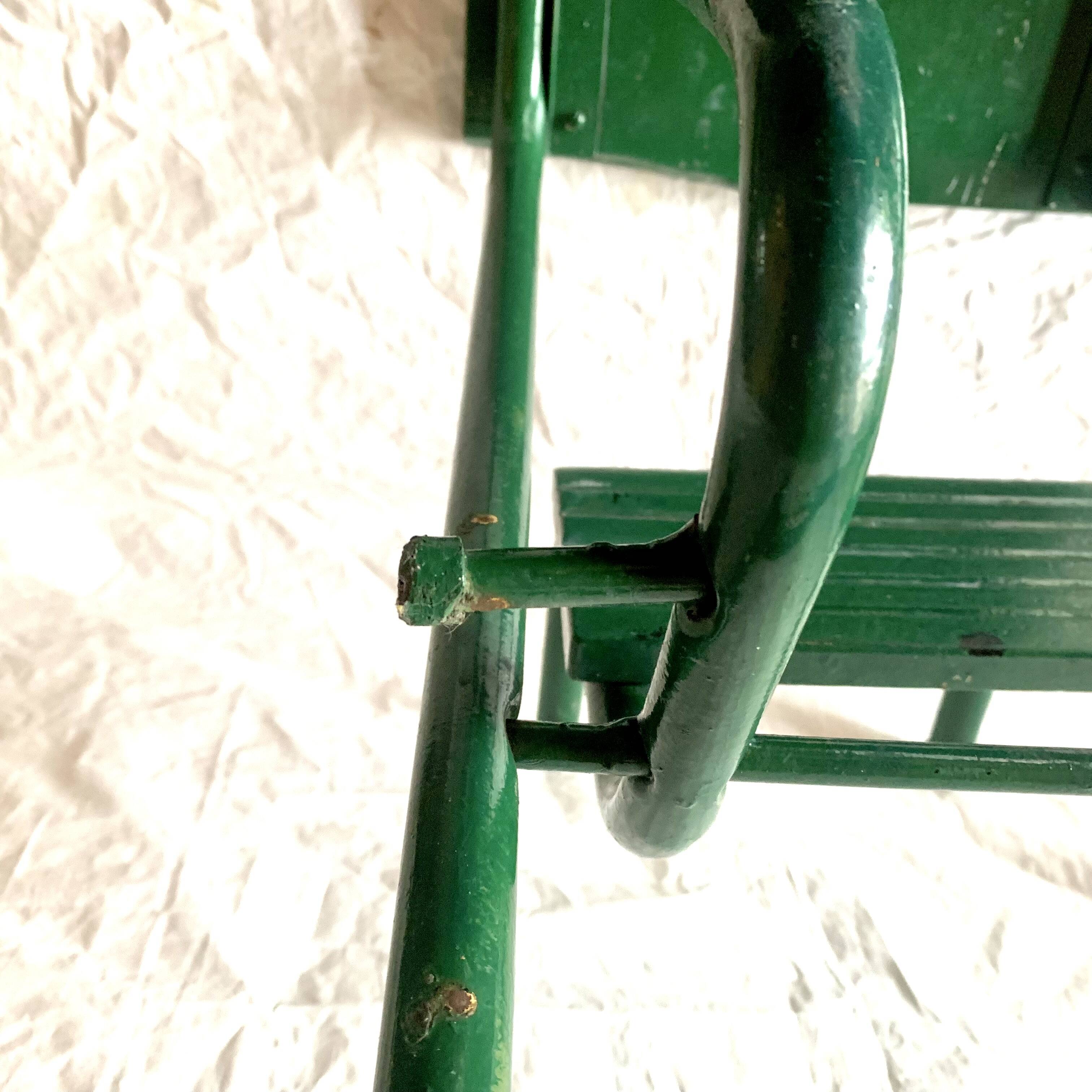 Vintage stepladder in green painted wood and steel