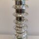 Table lamp made of transparent crystal glass and silver colored spacers.