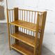 1970s honey-colored folding bamboo shelf