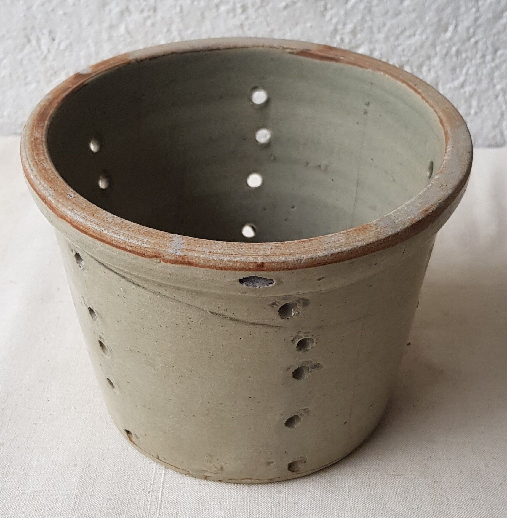 Pot with pheasant in earth