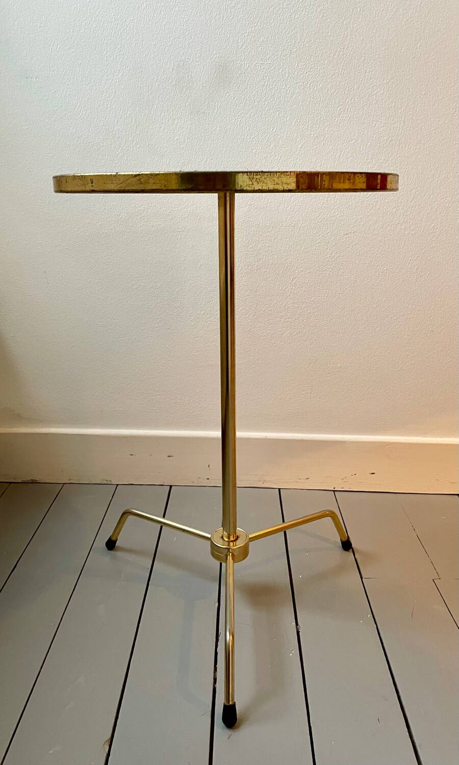 Vintage tripod pedestal table in gold metal