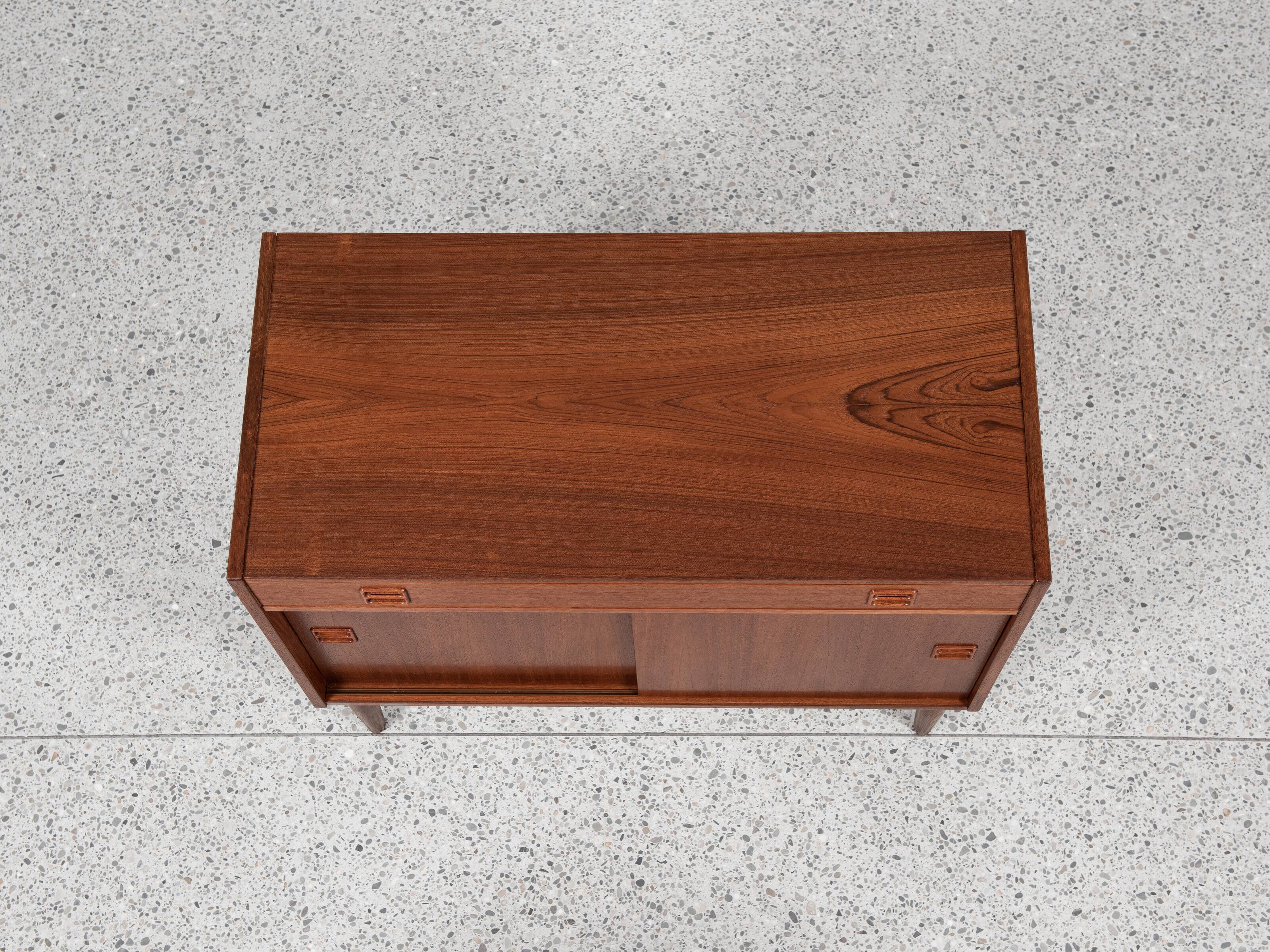 Midcentury Danish cabinet in teak with 1 drawer and 2 sliding doors 1960s