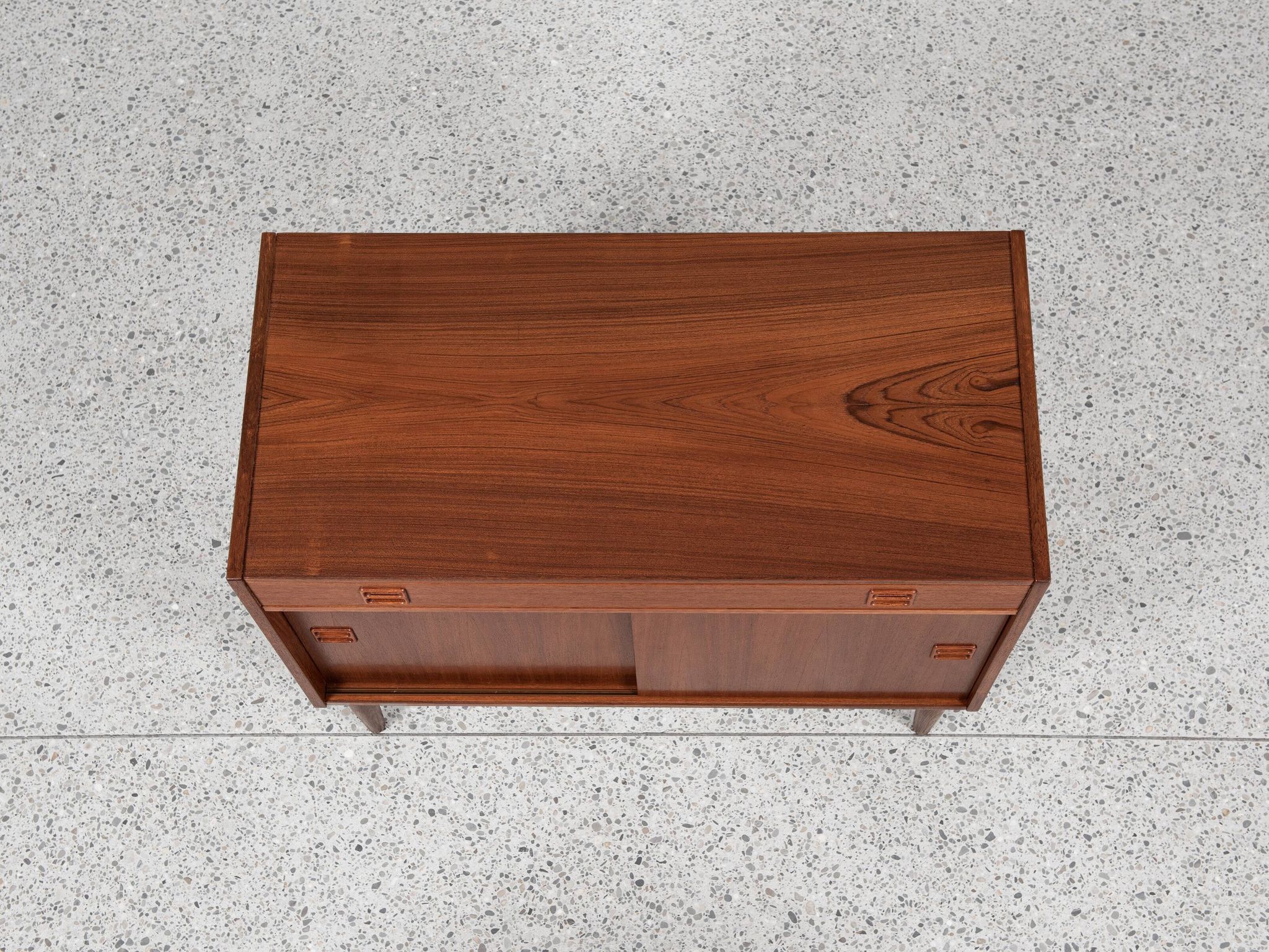 Midcentury Danish cabinet in teak with 1 drawer and 2 sliding doors 1960s