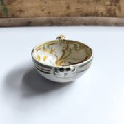Vintage bowl signed Keraluc Quimper in yellow and green.