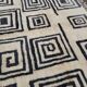 Moroccan Berber rug in cream and black 300x200 cm – spiral geometric pattern