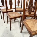 Art Deco table and six chairs in solid walnut, 20th century.
