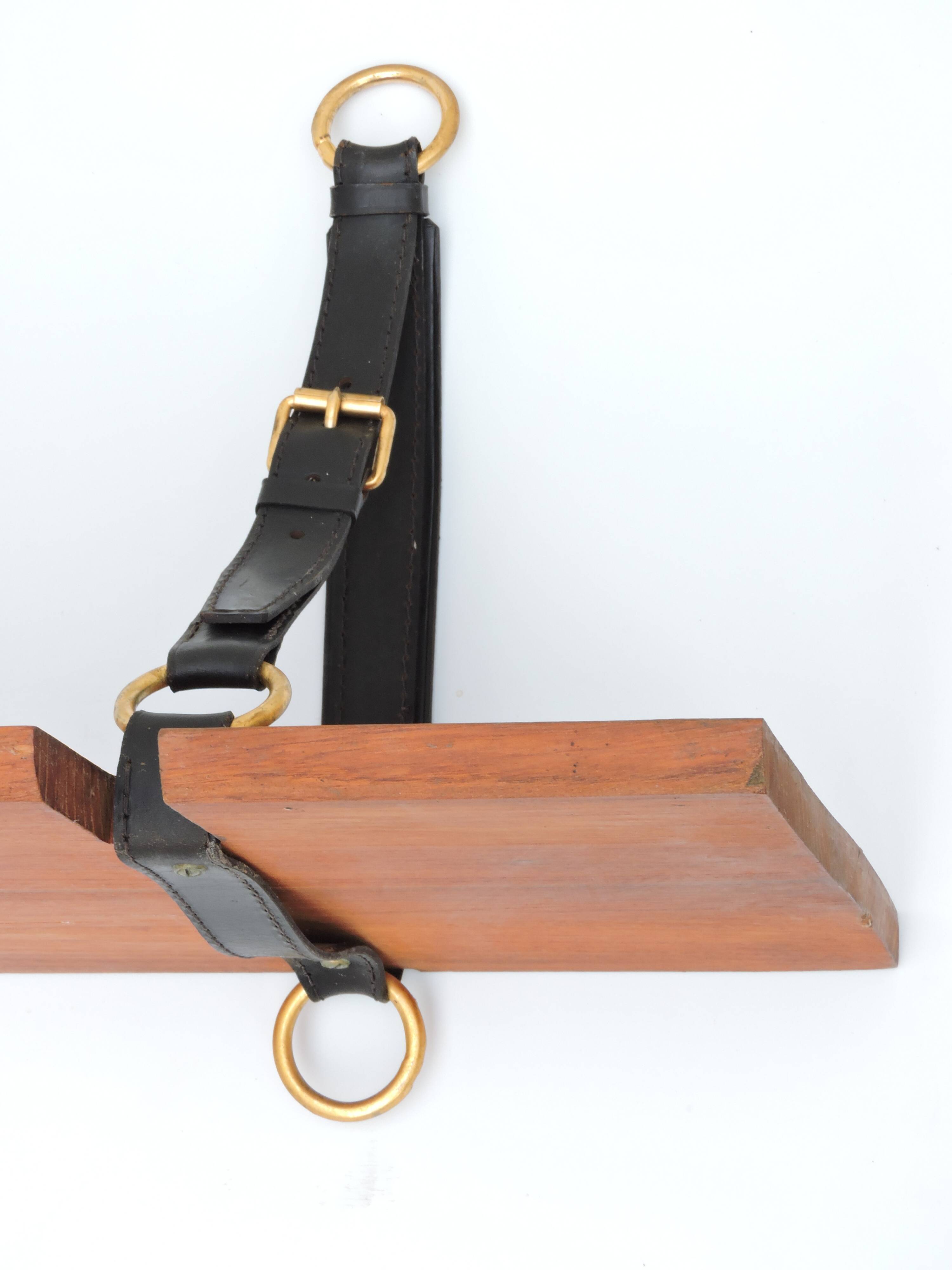 Elm and leather shelf, distributed by the Maison et Jardin Gallery in the 60