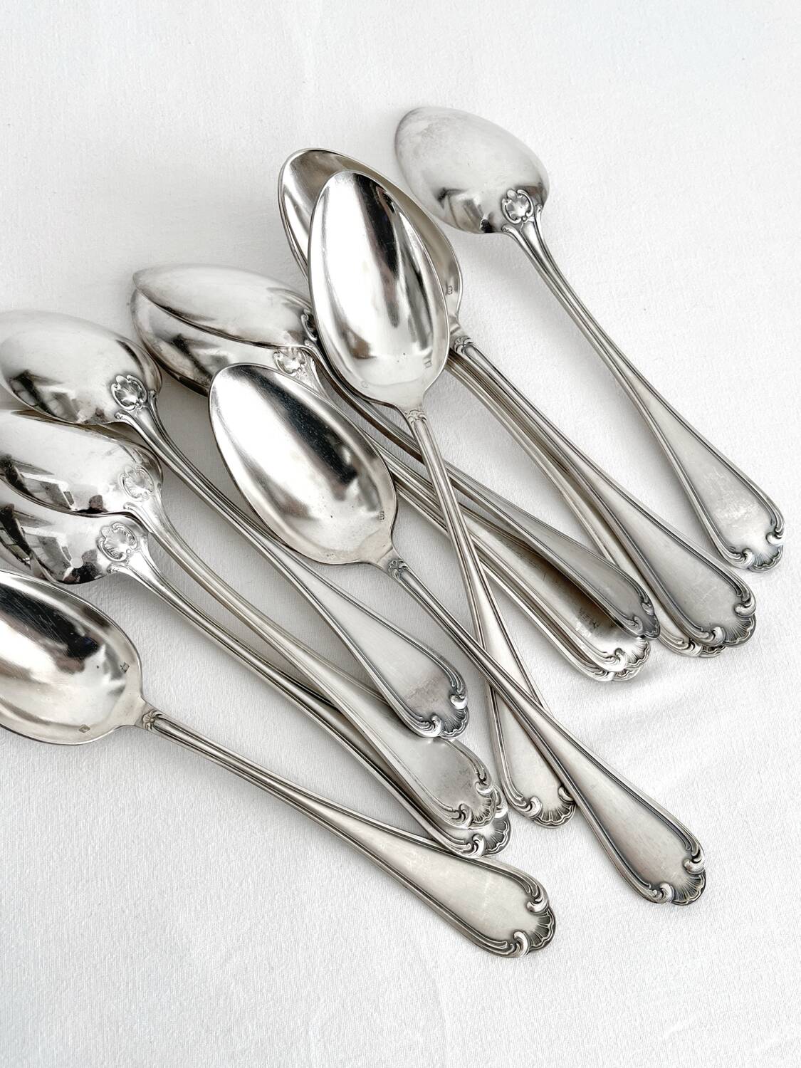 12 antique silver plated shell soup spoons