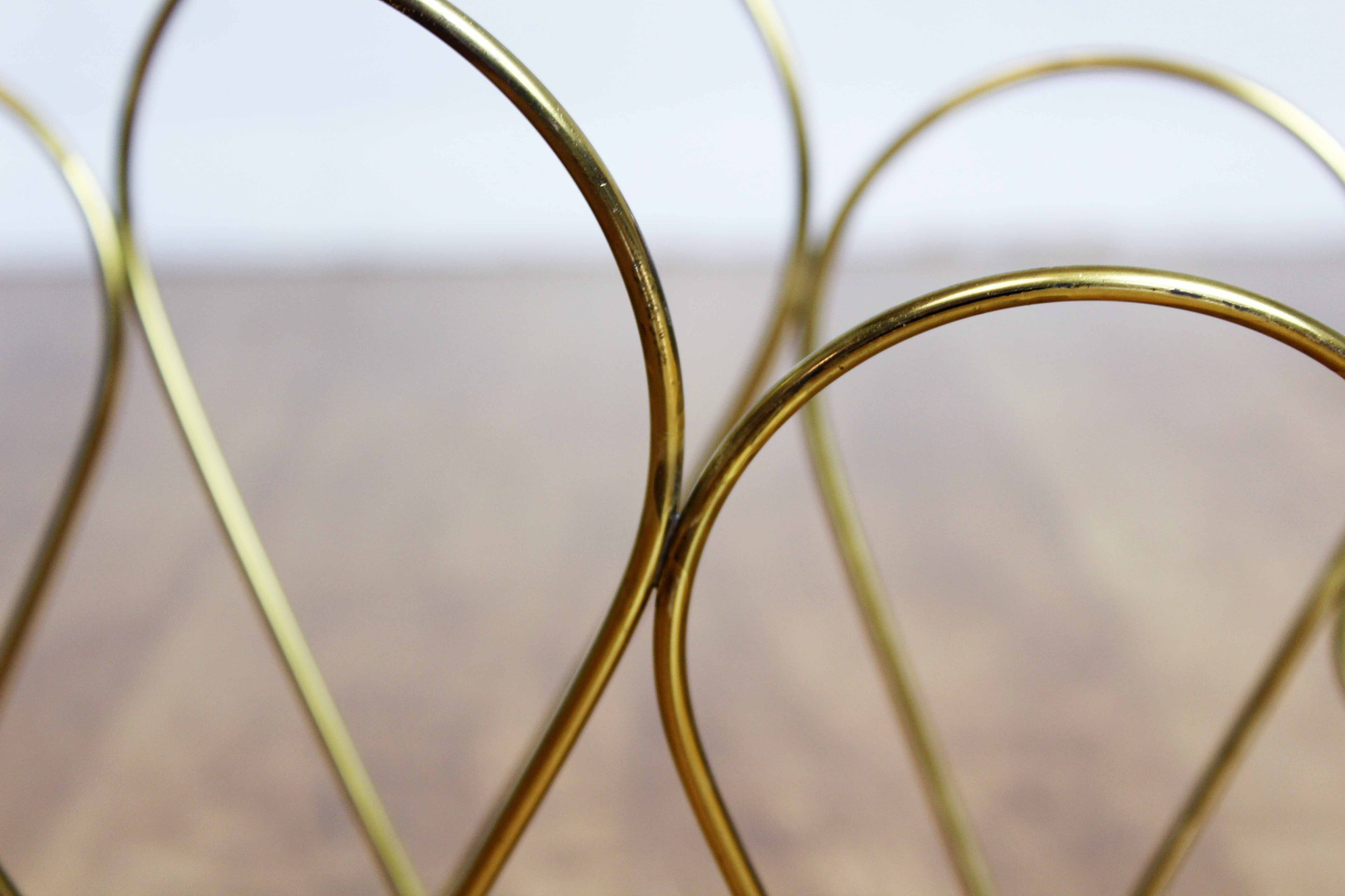 Magazine rack in brass 60