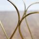 Magazine rack in brass 60