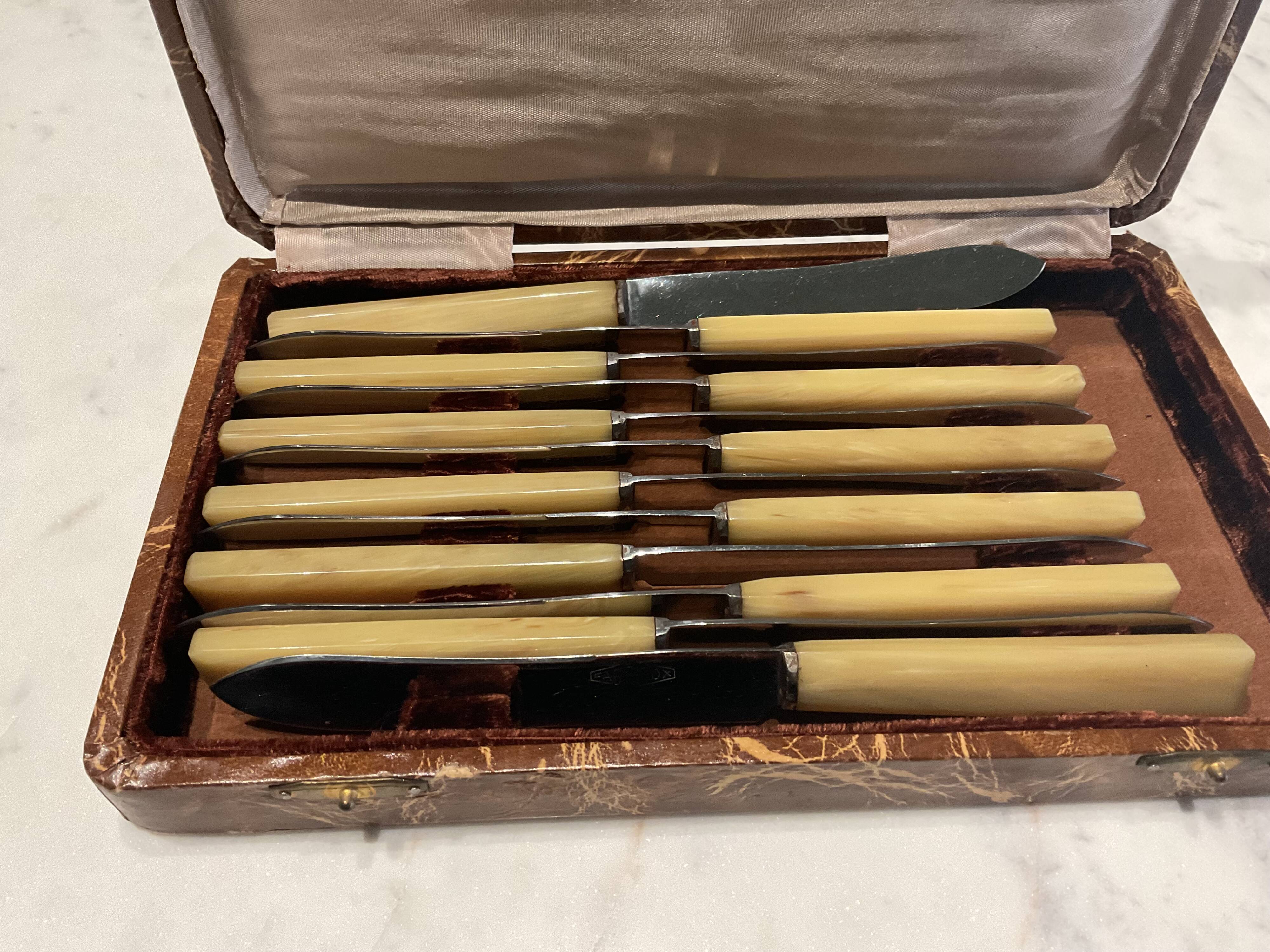 12 cheese knives. Vintage