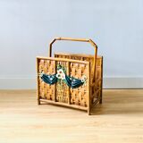 Vintage rattan magazine holder with floral decoration