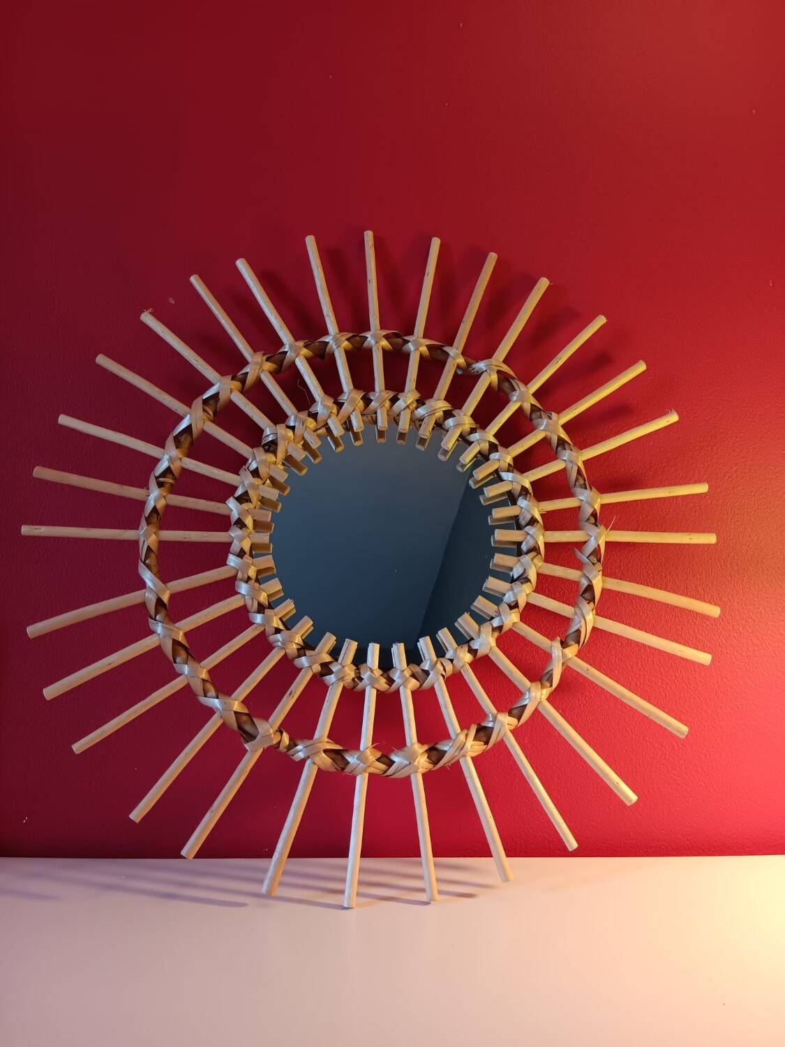 Vintage bohemian woven rattan sun mirror