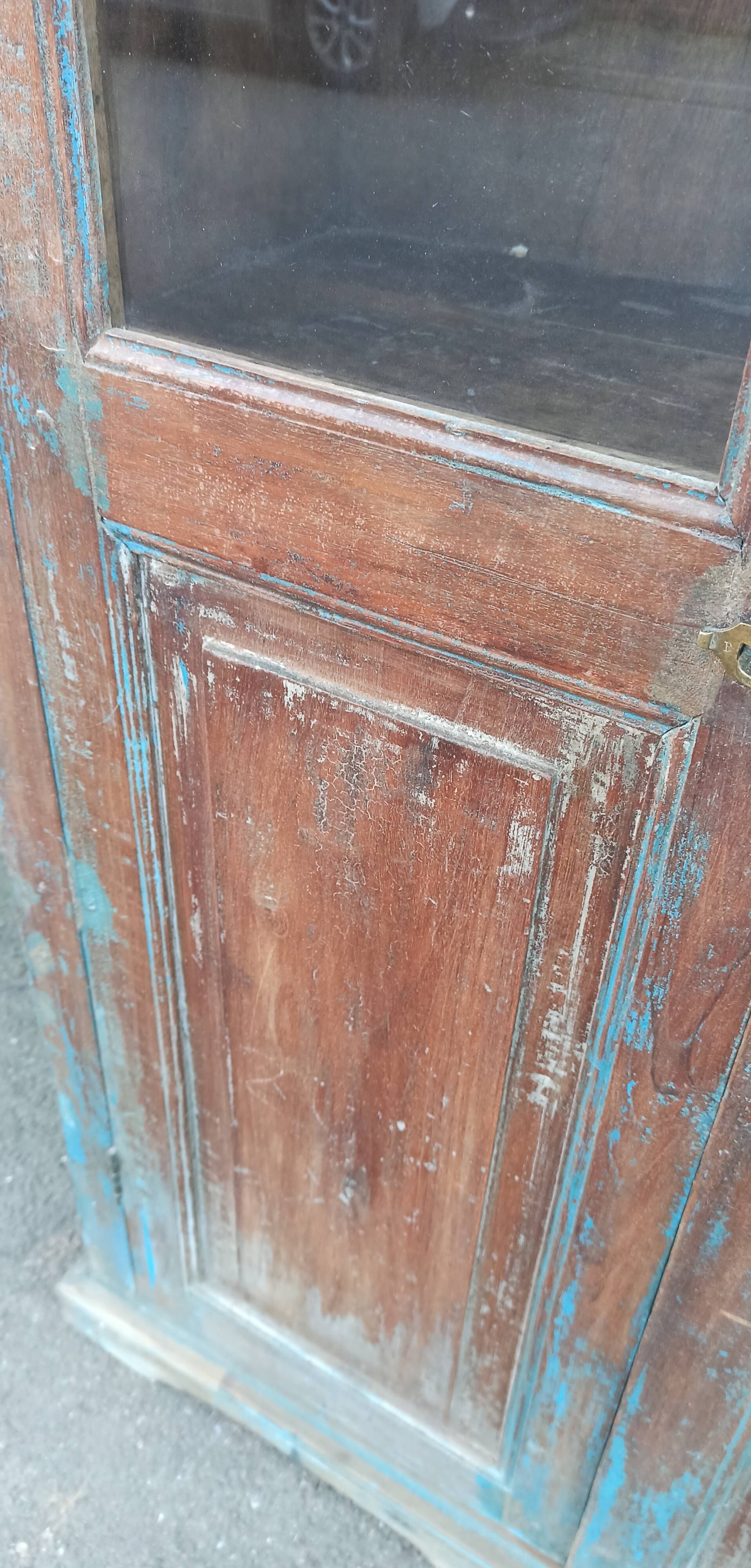 Old glazed wooden cabinet with beautiful patina