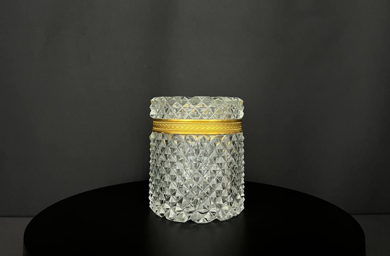 Cut crystal box with gilded bronze mount.