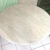 Round marble table with central cast iron leg