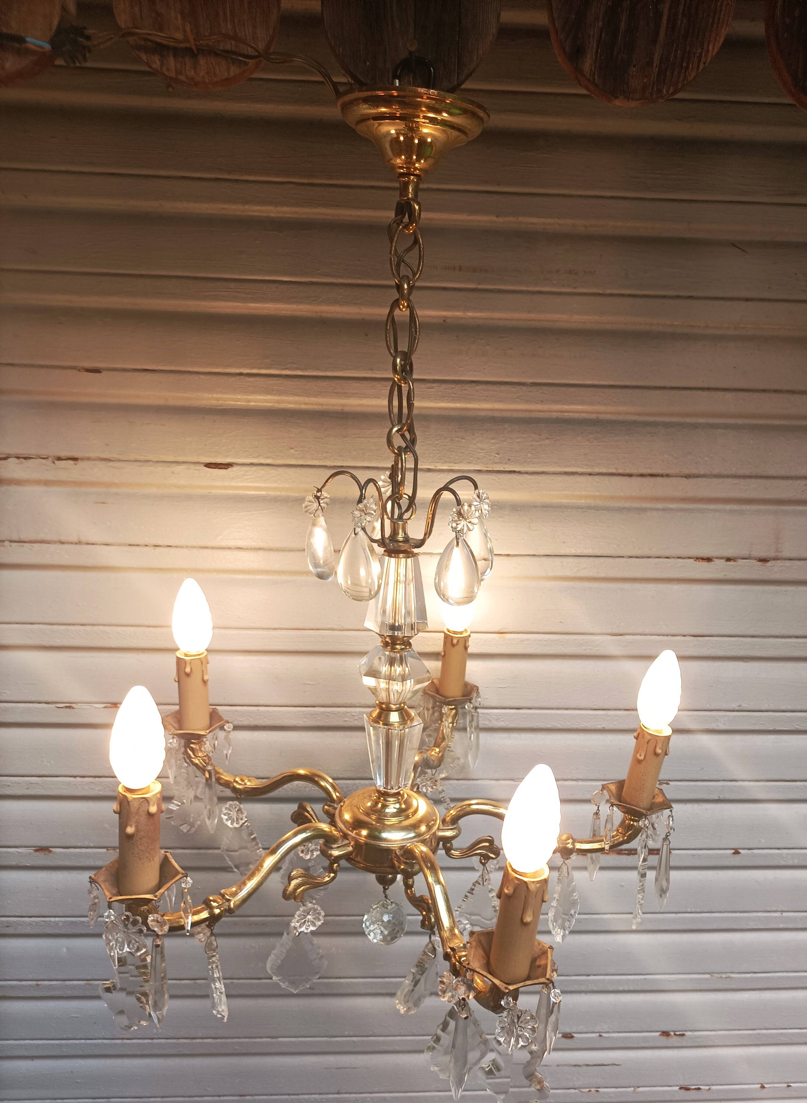 Exceptional bronze chandelier with crystal pendants in working order circa 1910