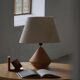 Sculptural Danish modern table lamp in wood by Kirk, 1980s.