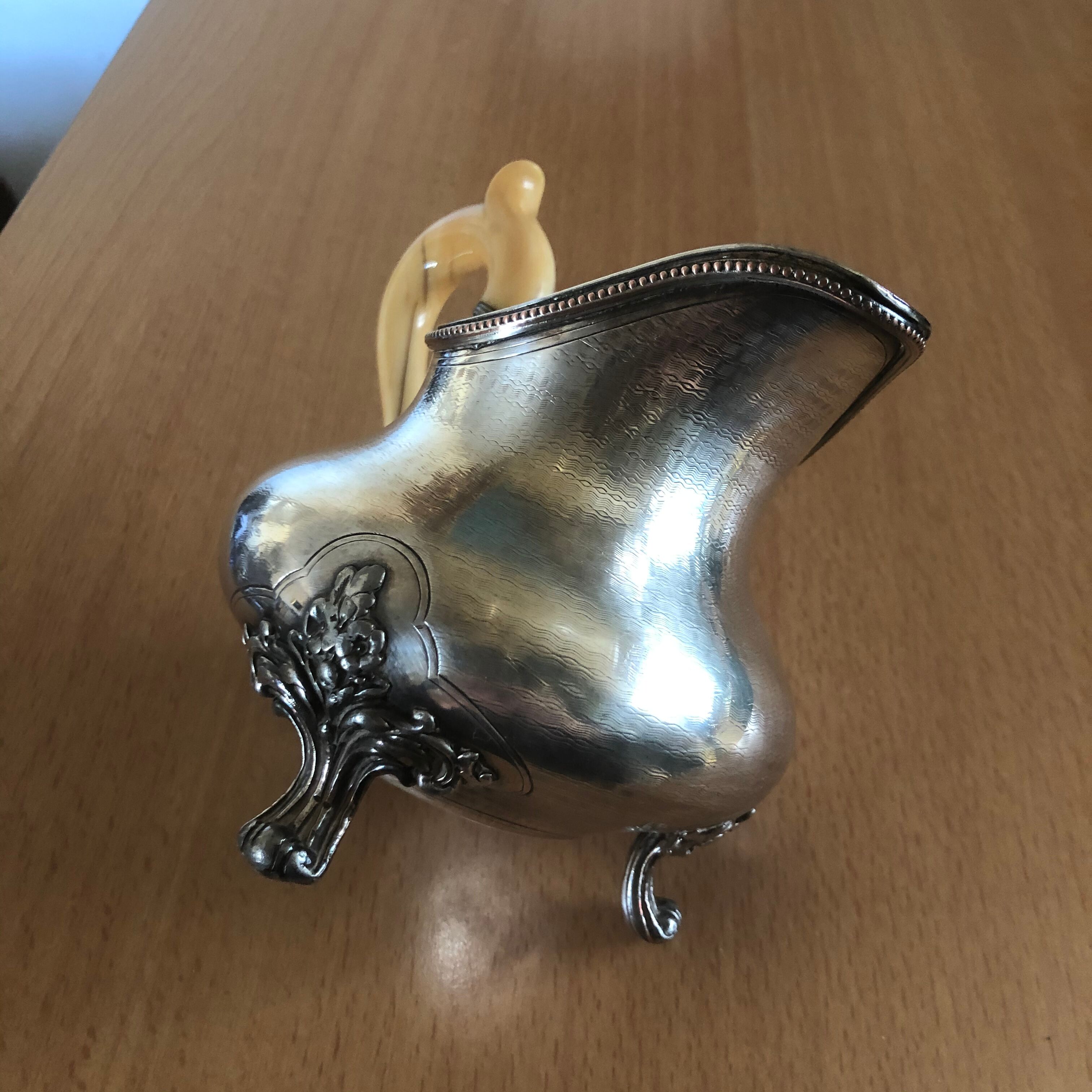 Silver metal milk pot