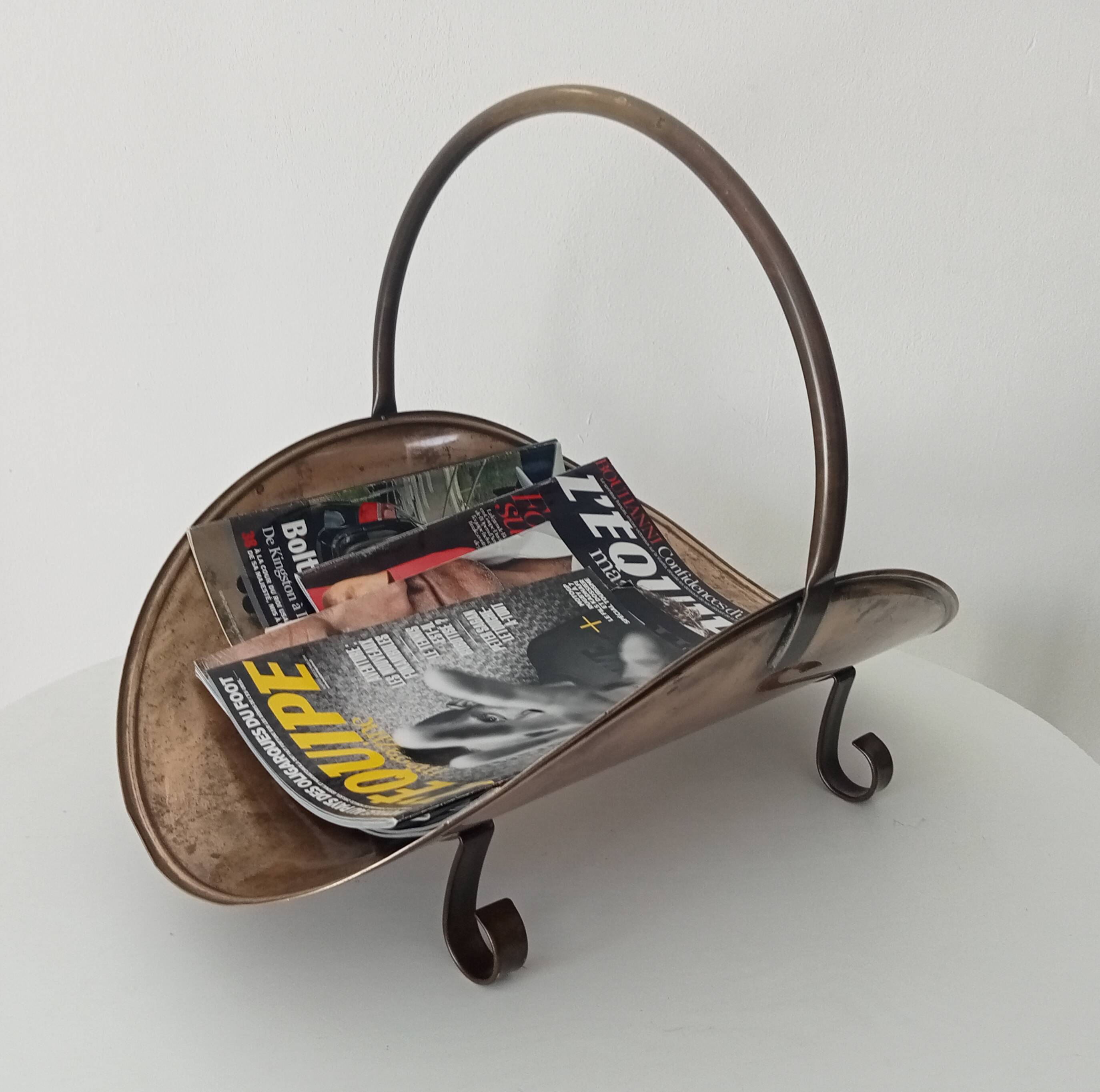 Old brass log holder