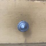 On a piece of furniture with sorting lockers and drawers