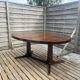 Extendable oval table Baumann, for up to 12 place settings.