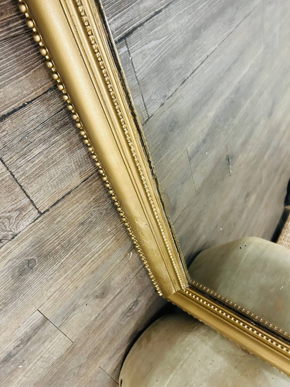Antique gilded mirror in old Louis Philippe wood