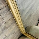 Antique gilded mirror in old Louis Philippe wood