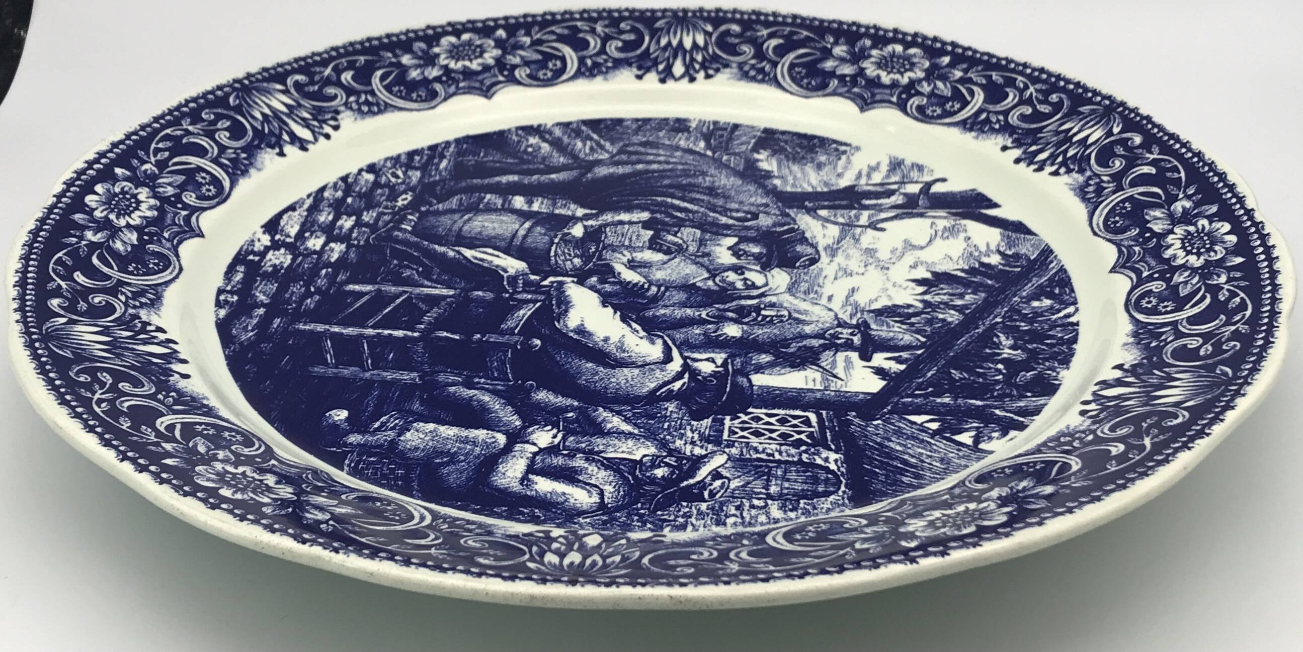 Blue enamelled earthenware wall dish with peasant scene decor Boch La Louvière