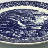 Blue enamelled earthenware wall dish with peasant scene decor Boch La Louvière