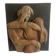 Wood sculpture bas-relief of man, woman, and child, signed.