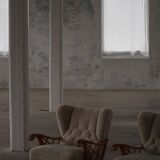 Pair of modern Swedish lounge chairs, shearling sheepskin and elm, 1940s.