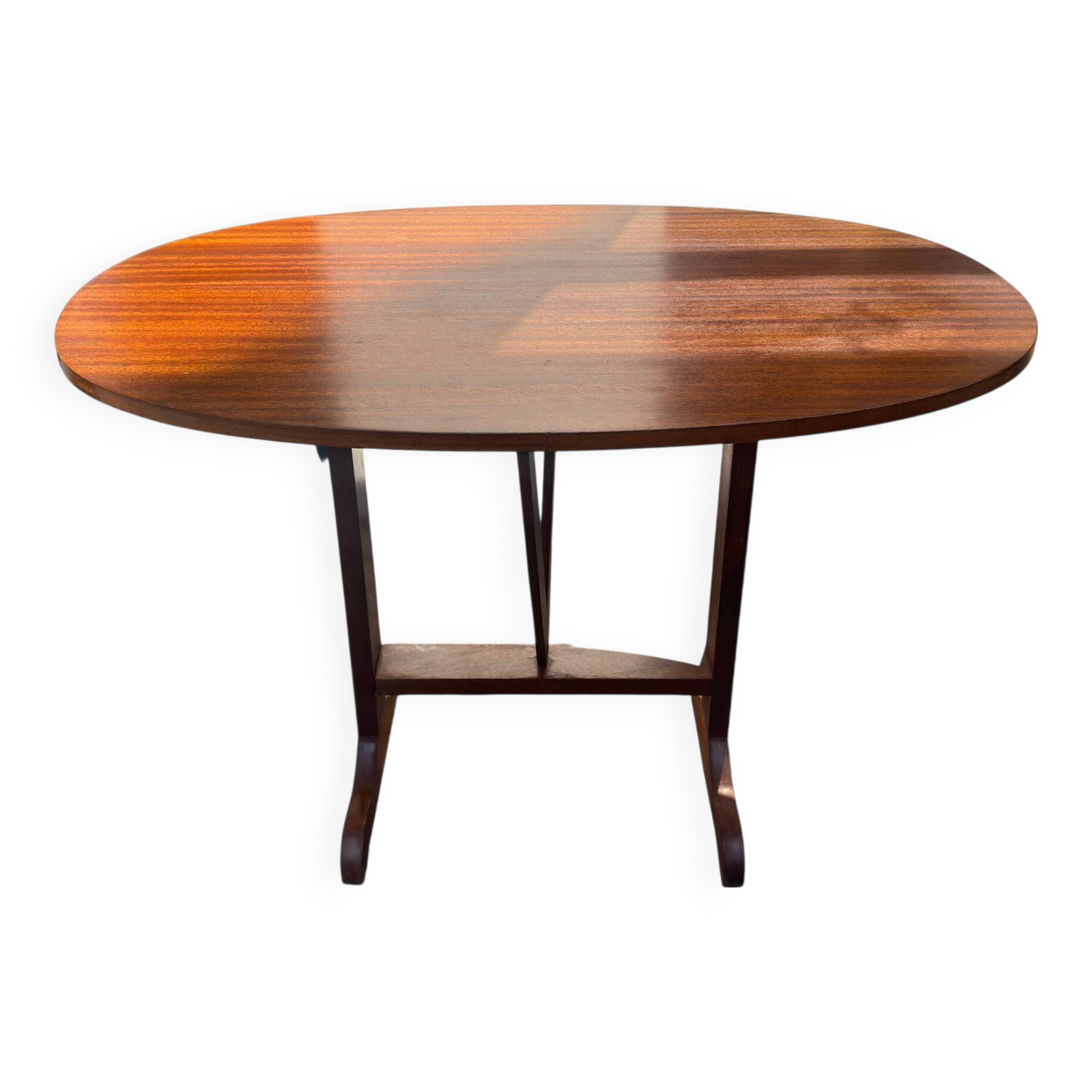 Oval folding table – mahogany veneer – V-shaped base – France, circa 1970