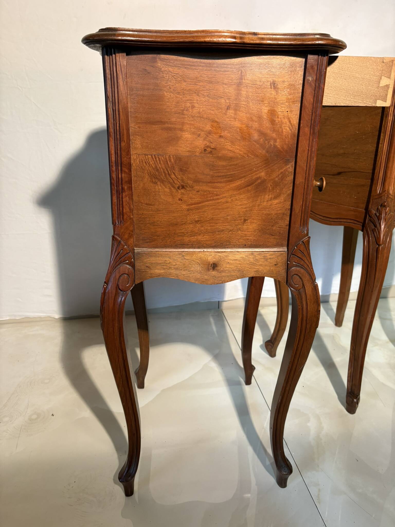 Pair of antique bedside tables with marble top and ceramic niche