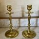 Old pair of turned brass candlesticks