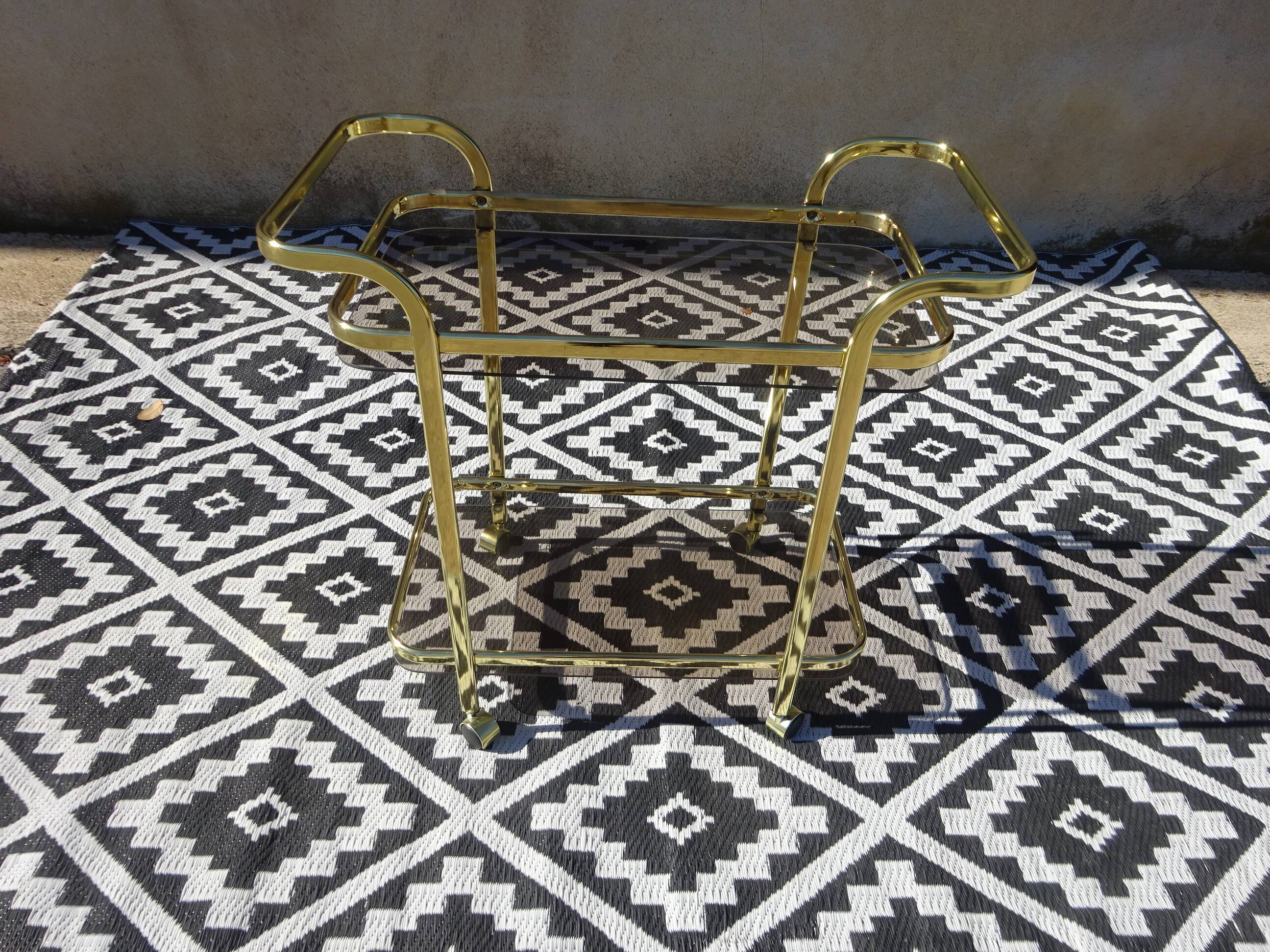 Desserte en métal doré et verre