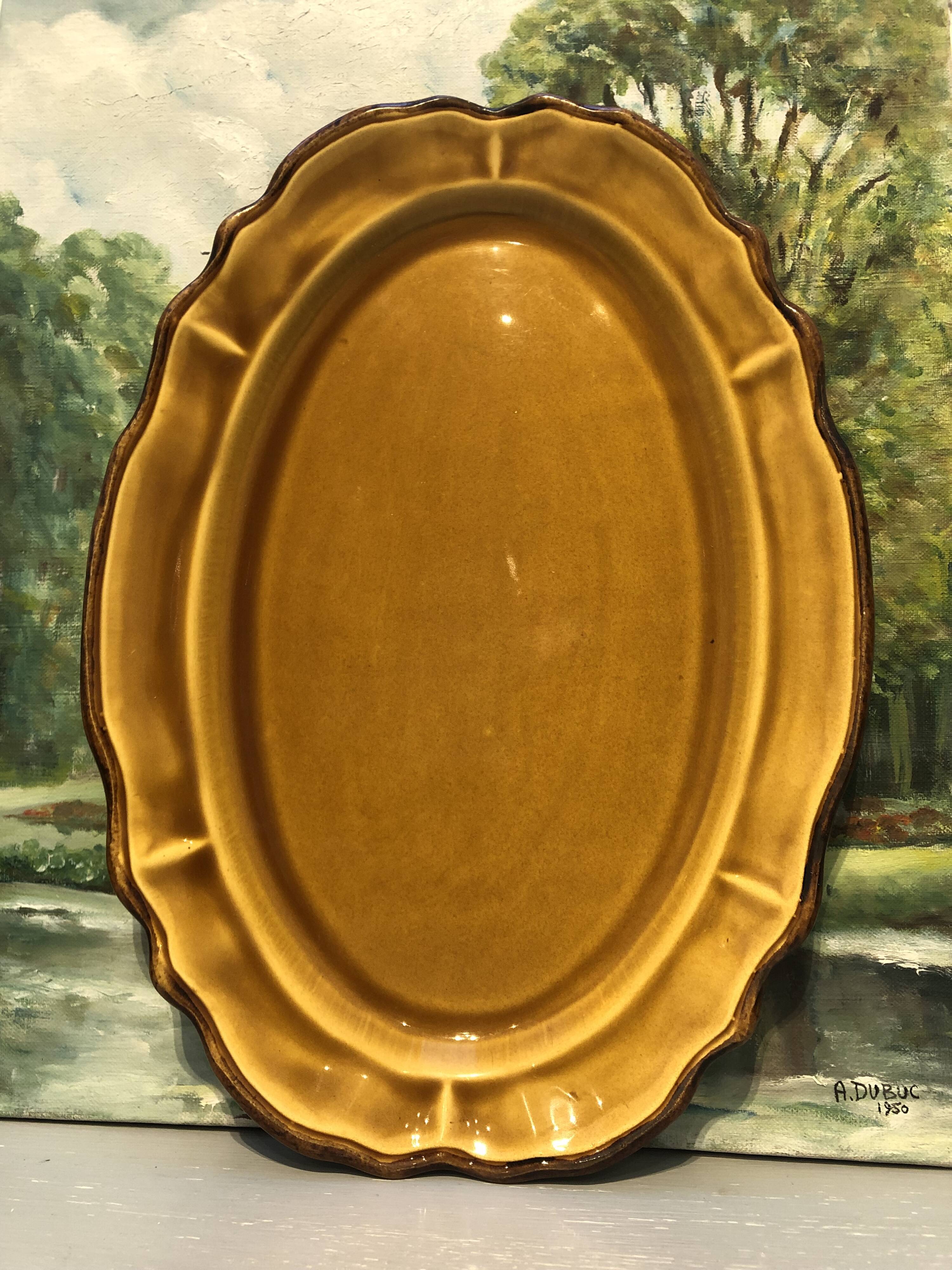 Oval dish caramel color chocolate brown edging signed faience haute provence made in France
