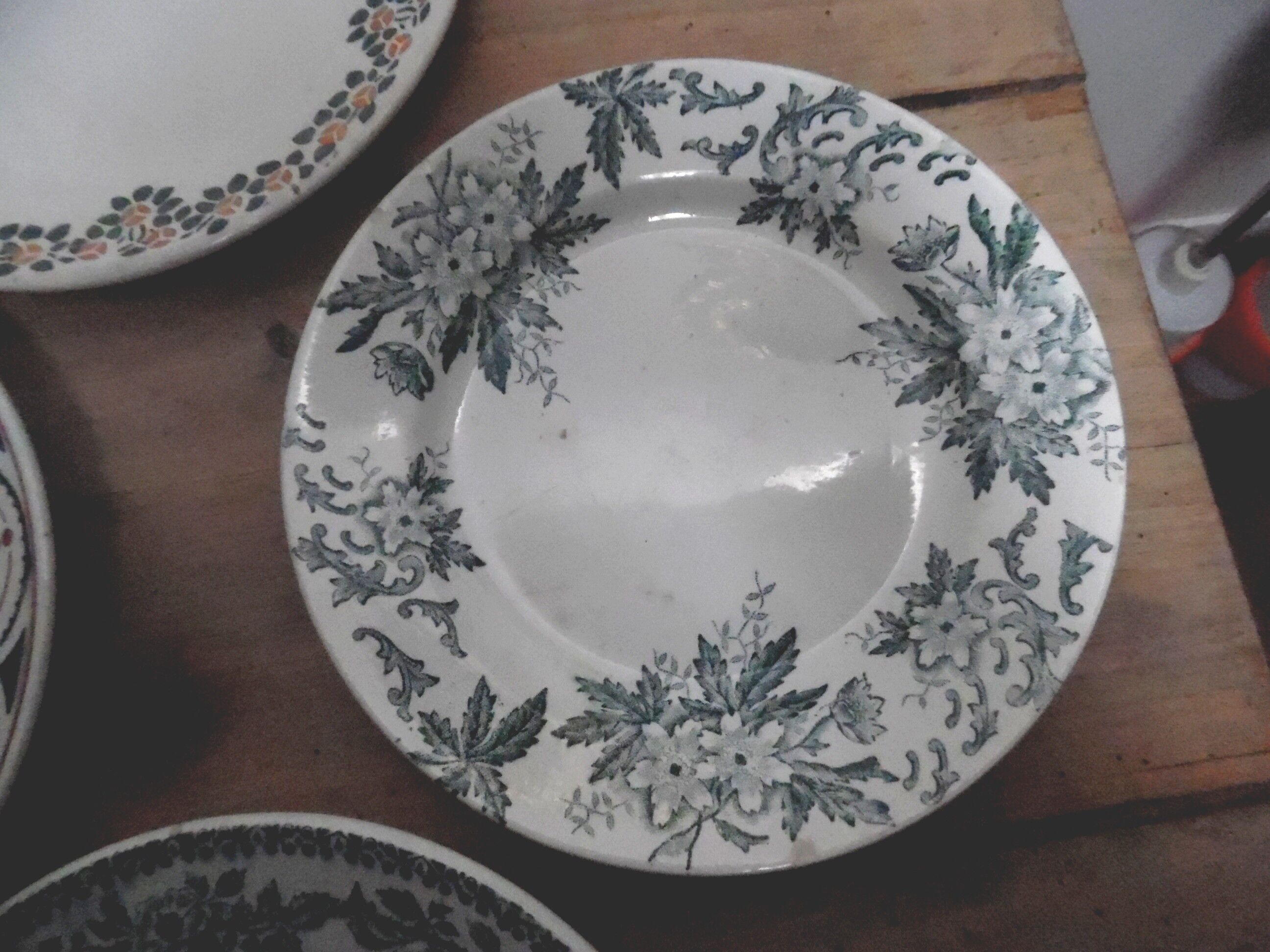 six plates mismatched earthenware