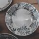 six plates mismatched earthenware
