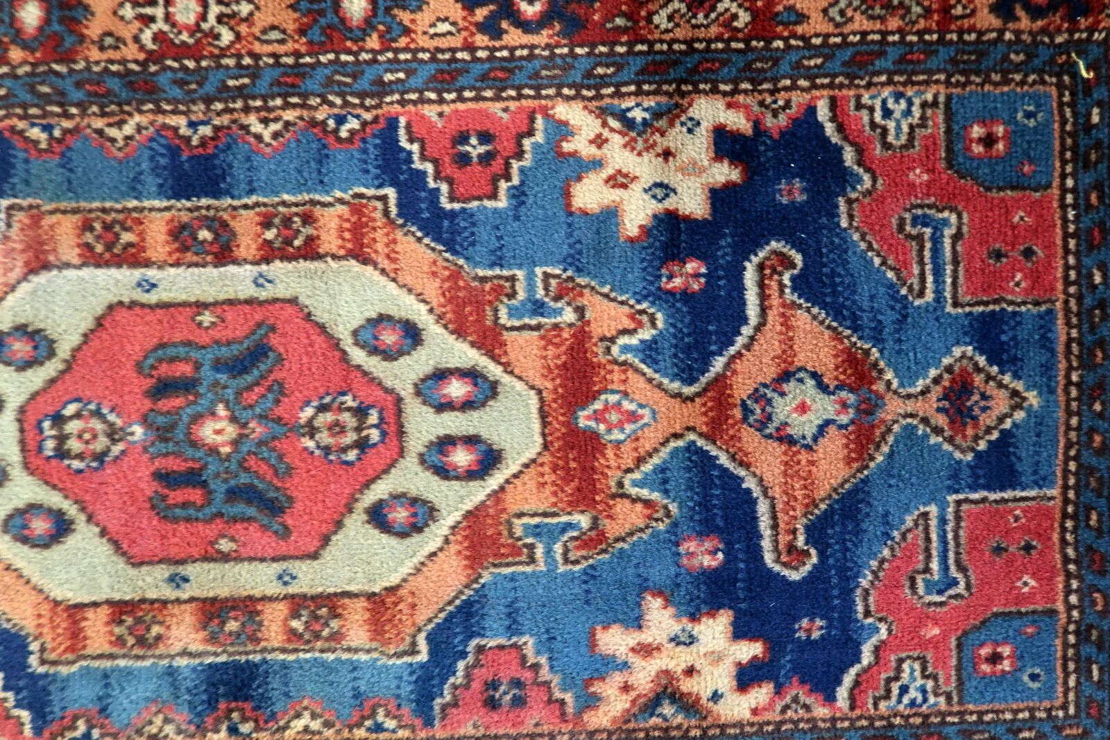 Vintage 1950s German tribal style wool rug, geometric medallion, 84cm x 180cm