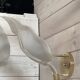 Set of 3 Murano glass wall lamps in white and brass, 1970s.