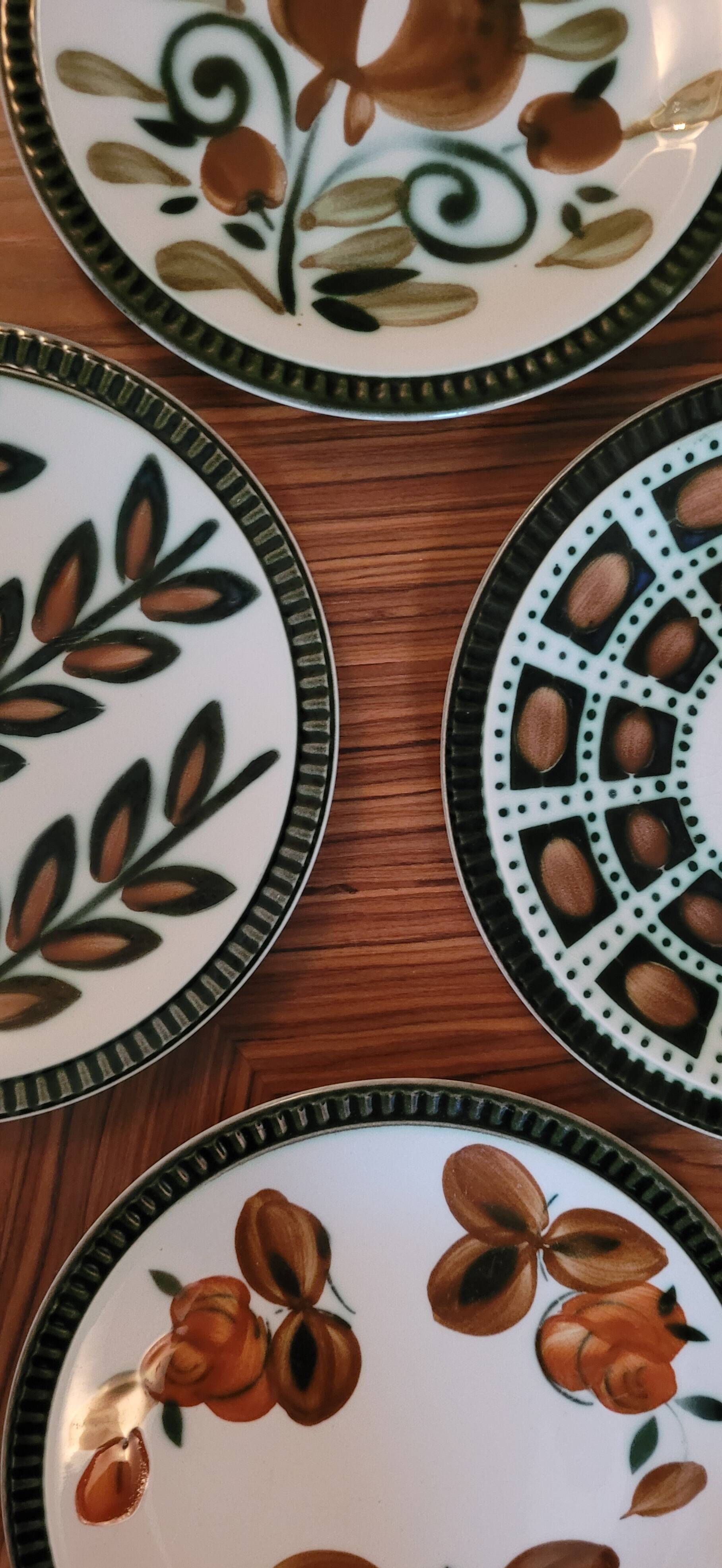 Set of 4 mismatched plates Delta Boch 1966