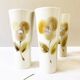 Large ceramic glasses, hand-painted flower pattern, beige/cream tones