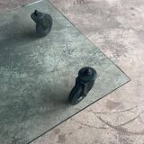 Gae Aulenti coffee table for Fontana Arte, transparent glass top with black cast iron supports, 1980s.