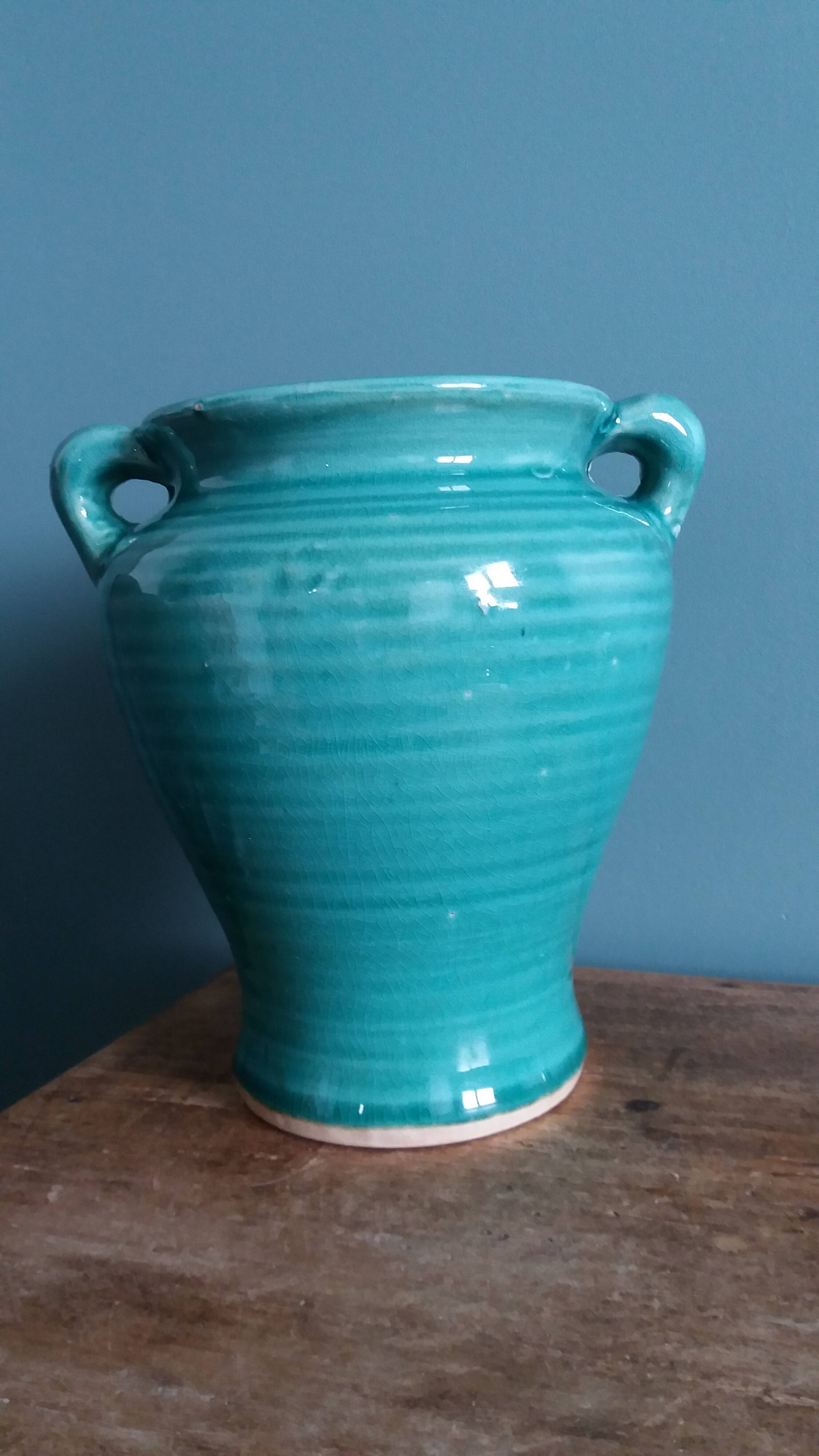 Glazed green-blue ceramic vase