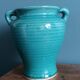 Glazed green-blue ceramic vase